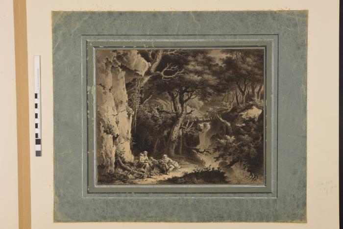 Rocky landscape with three seated figures
