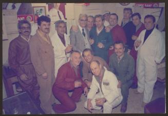 Group photo during retirement party at Malta Drydocks Steel Shop