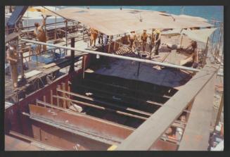 Yacht "Atlantide" at Manoel Island Yacht Yard (Malta) -  prefabricated deck being pushed in place.
