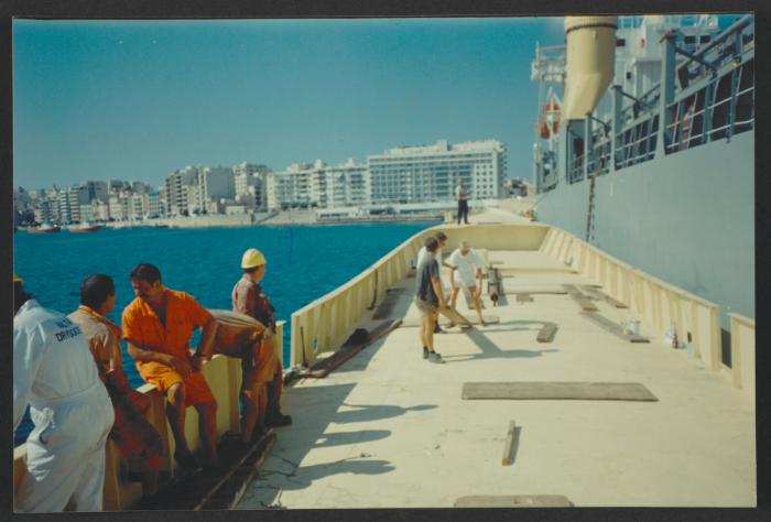 Yacht "Atlantide" at Manoel Island Yacht Yard (Malta) -  (Banana Boat nicknamed due to the yellow paint) being prepared to be lifted on mother ship for transport to Gosport UK.