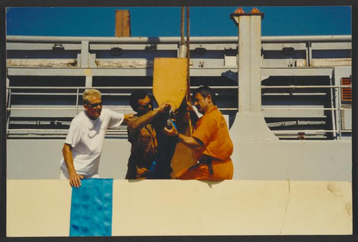 Yacht "Atlantide" at Manoel Island Yacht Yard (Malta) -  (Banana Boat nicknamed due to the yellow paint) being prepared to be lifted on mother ship for transport to Gosport UK.