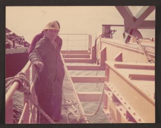 Malta Drydocks unidentified employees working on a platform afloat