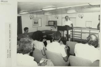 Commanding Officer addressing people while onboard "HMS BROADSWORD" (1976)