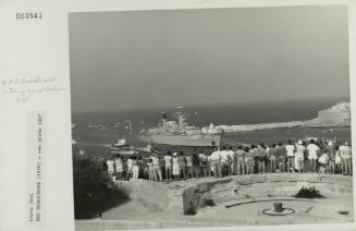 Crowds gathered at Fort St. Elmo to see "HMS BROADSWORD" (1976) leave the Grand Harbour