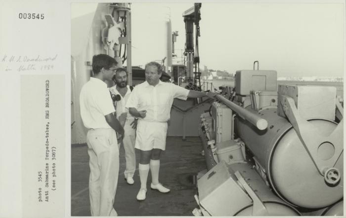 Crew member onboard "HMS BROADSWORD" (1976) showcasing Anti Submarine Torpedo-tubes