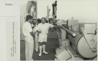 Crew member onboard "HMS BROADSWORD" (1976) showcasing Anti Submarine Torpedo-tubes