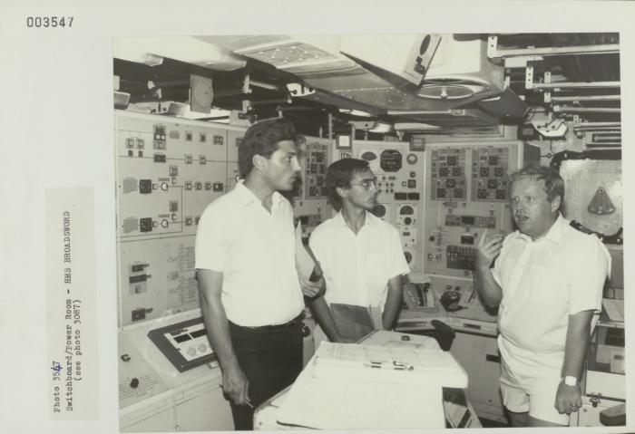Crew member onboard "HMS BROADSWORD" (1976) showcasing the ship's Switchboard/Power Room