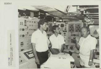 Crew member onboard "HMS BROADSWORD" (1976) showcasing the ship's Switchboard/Power Room