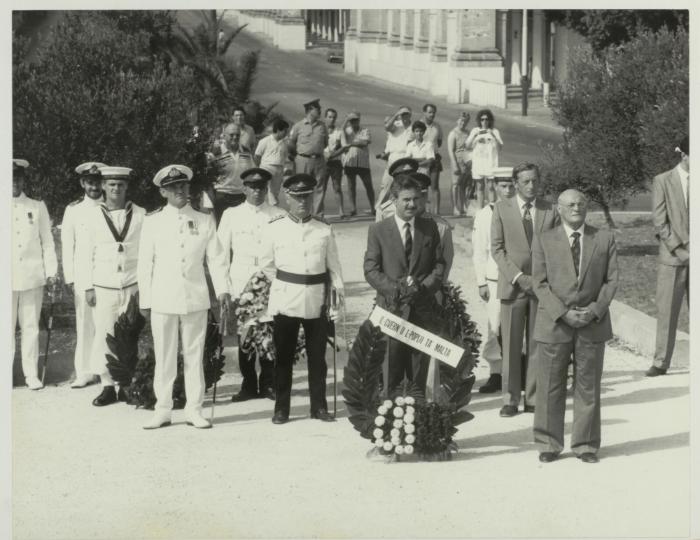 HE the President of Malta Dr. Censu Tabone standing at the foot of the War Memorial monument in Floriana Malta
