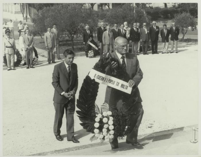 HE the President of Malta Dr. Censu Tabone placing a wreath on the War Memorial monument in Floriana Malta