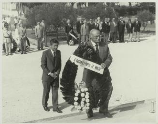 HE the President of Malta Dr. Censu Tabone placing a wreath on the War Memorial monument in Floriana Malta