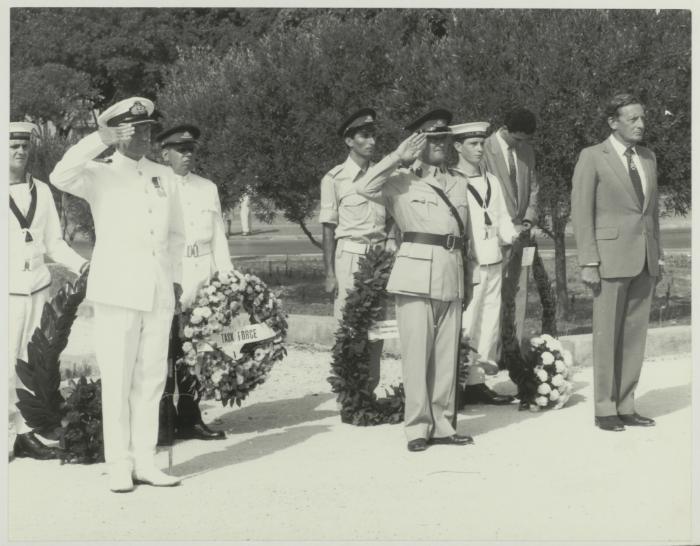 British Officers saluting HE the President of Malta Dr. Censu Tabone as he lays a wreath on the War Memorial monument in Floriana Malta
