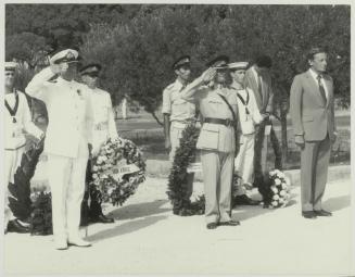 British Officers saluting HE the President of Malta Dr. Censu Tabone as he lays a wreath on the War Memorial monument in Floriana Malta