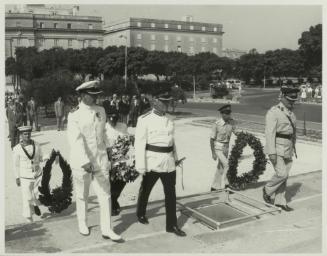 British and Maltese Officers laying wreaths on the War Memorial monument in Floriana Malta