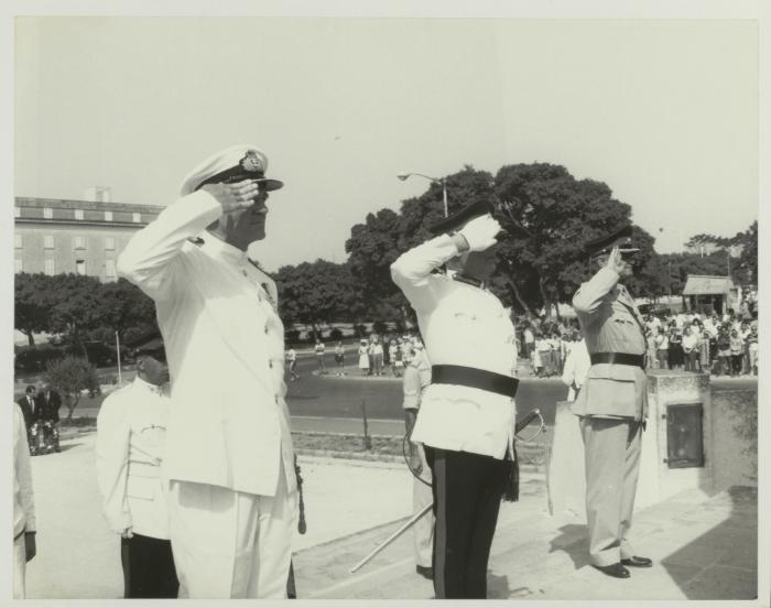 British and Maltese Officers saluting at the War Memorial monument in Floriana Malta