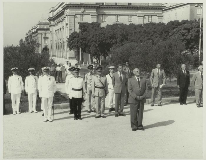 HE the President of Malta Dr. Censu Tabone and attendees standing at the foot of the War Memorial monument in Floriana Malta