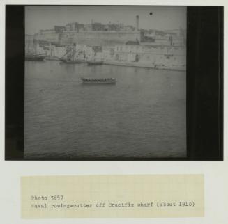 Naval rowing-cutter off Crucifix wharf (circa. 1910)