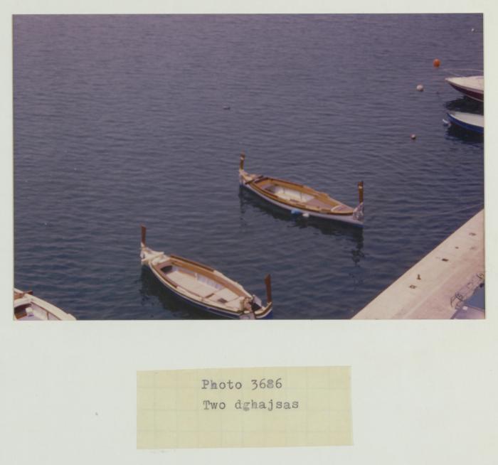Two docked dghajes tal-pass
