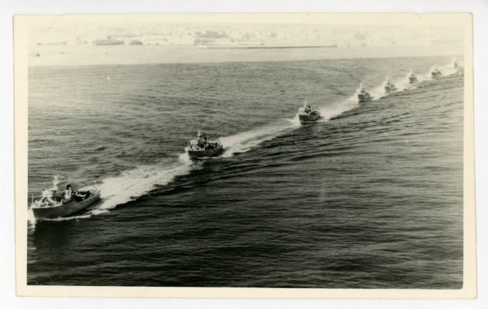 Numerous boats sailing one after another