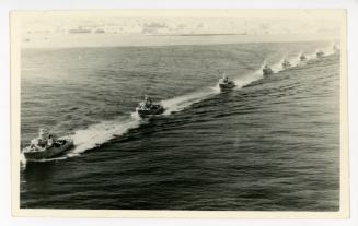 Numerous boats sailing one after another