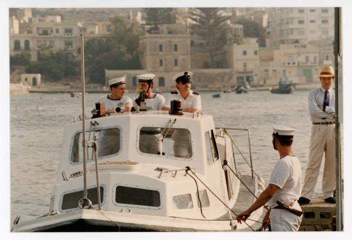 Sailors from "HMS ARK ROYAL" onboard a small boat in Malta