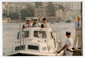 Sailors from "HMS ARK ROYAL" onboard a small boat in Malta