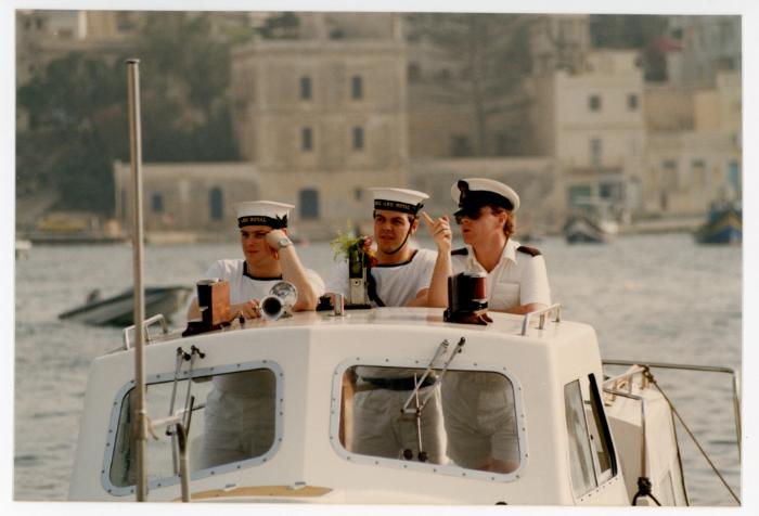 Sailors from "HMS ARK ROYAL" onboard a small boat in Malta