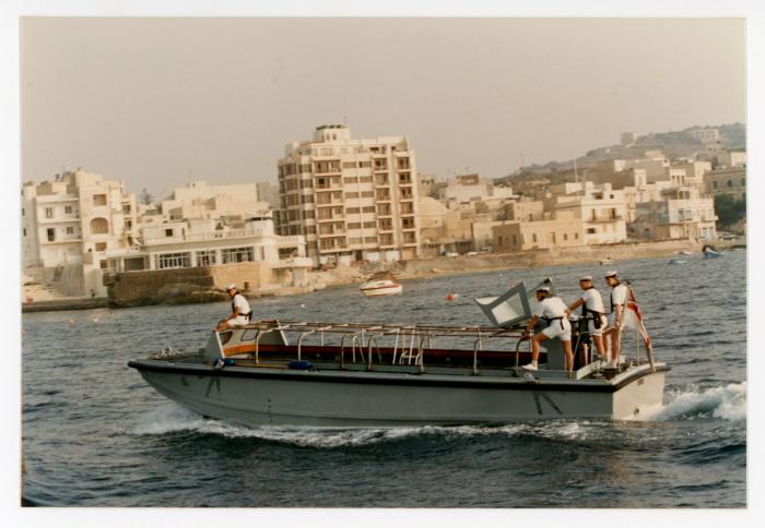 Sailors from "HMS ARK ROYAL" onboard a small boat in Malta