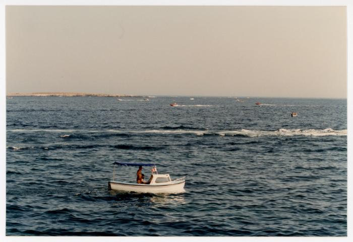 A couple onboard a small boat