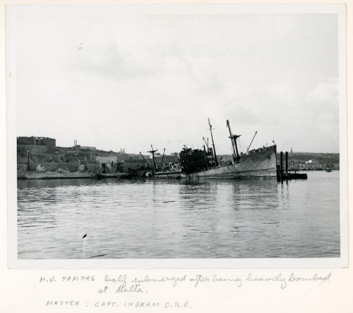 Cargoship "PAMPAS" of the British Royal Mail Line half submerged at Malta after bombardment