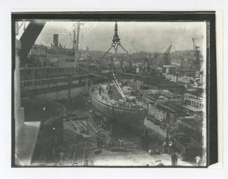 "M.F.V. 77" (Motor Fishing Vessel) lifted on jetty near No. 3 Dock