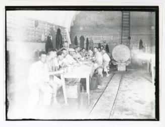 Workers on lunch break at the Bruno Stores in Kalkara, Malta