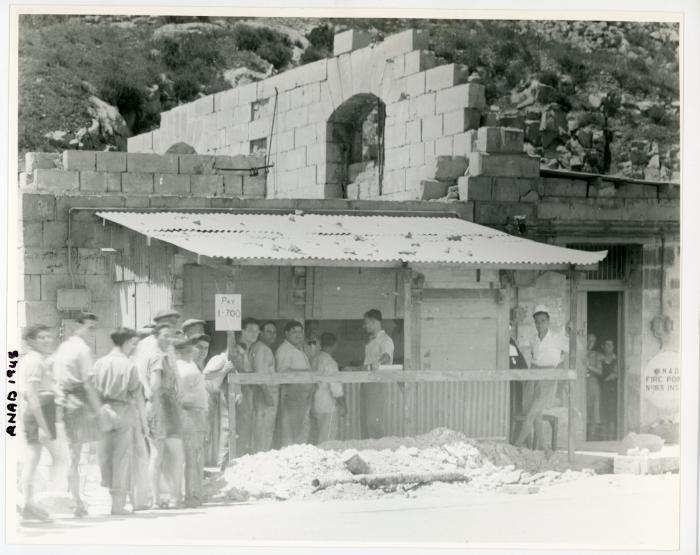 People queuing at a R.N.A.D. (Royal Naval Armaments Depot)