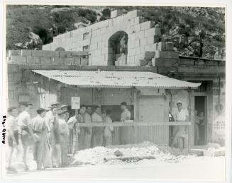 People queuing at a R.N.A.D. (Royal Naval Armaments Depot)