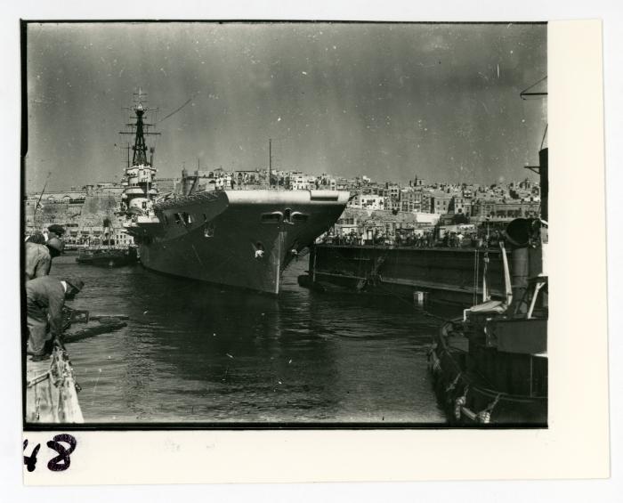 British tugboat (paddle-type) "HMS ROBUST" (1907) assisting in the docking of "HMS OCEAN"