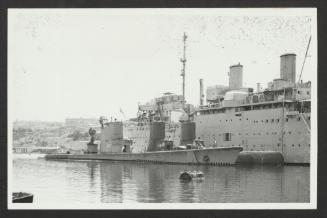 American Gato-class submarine USS Pompon (SS/SSR-267), alongside American Tench-class submarines USS Thornback (SS-418) and USS Trutta (SS-421) next to what could be an unidentified Royal Navy submarine depot ship, at Msida Creek, Marxamxett Harbour, Malta