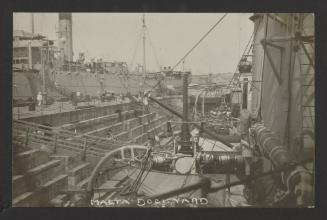 View captioned 'Malta Dockyard' from aboard a ship at the Malta Drydock