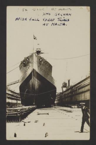British Queen Elizabeth-class battleship HMS Barham (04) at the Malta Drydock. Recto caption reads, "In Dock at Malta HMS Barham after full speed trials at Malta".