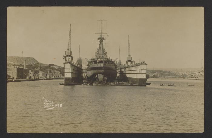 Admiralty Floating Dock No. 8, with Revenge-class battleship HMS Royal Oak (08) within, at Corradino, Grand Harbour, Malta