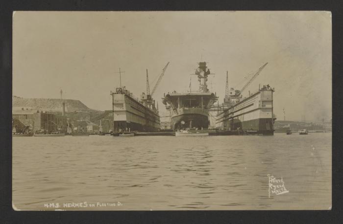 Admiralty Floating Dock No. 8, with aircraft carrier HMS Hermes (95) within, at Corradino, Grand Harbour, Malta