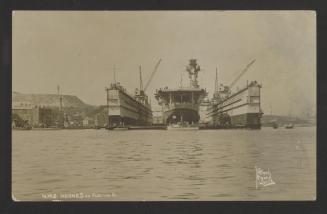 Admiralty Floating Dock No. 8, with aircraft carrier HMS Hermes (95) within, at Corradino, Grand Harbour, Malta
