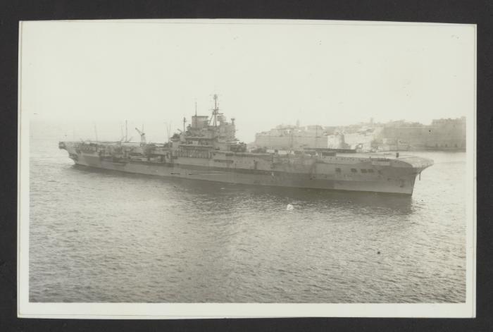 British Illustrious-class aircraft carrier HMS Indomitable (92) at Grand Harbour, Malta
