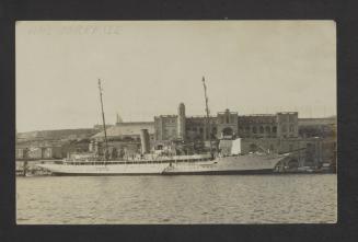 Luxury yacht HMS Surprise next to the Corradino Canteen
