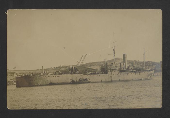 Unidentified auxiliary vessel in port