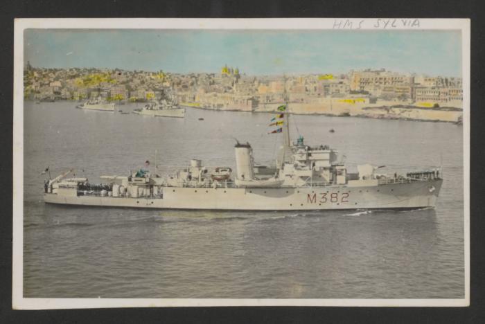 HMS Sylvia (M382) with two other vessels in the background