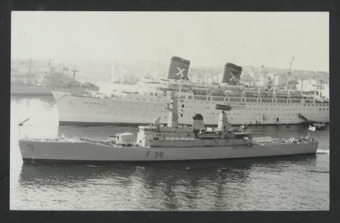 Arethusa (F38) with the Chandris Lines liner SS Australis in the background