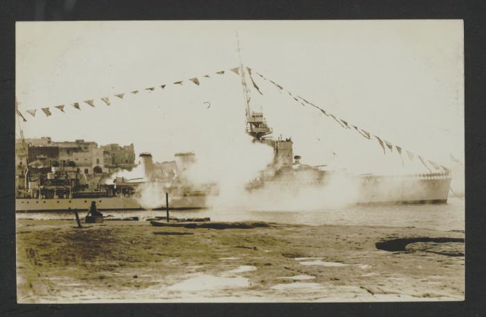 Surface warship with signal flags in (Marsamxett?) Malta