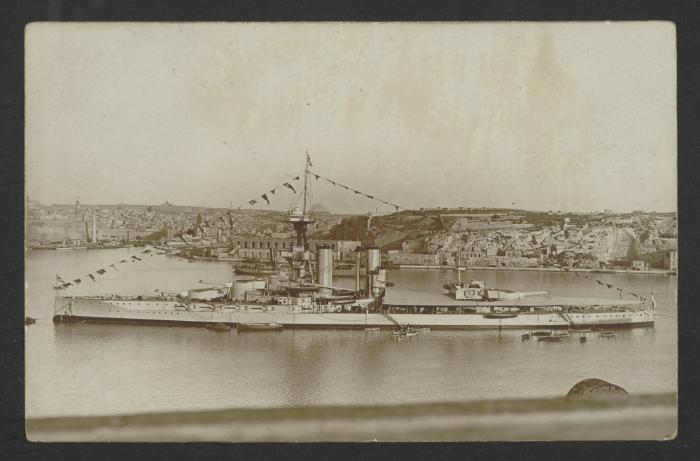 (Iron Duke-class?) battleship in Grand Harbour, Malta, with Corradino in the background