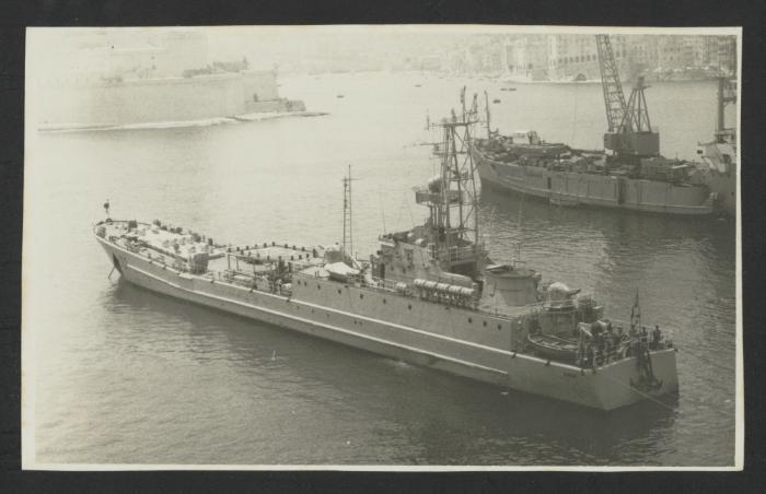 Surface warship with Pennant Number 112 in Grand Harbour, Malta, overlooking Fort St. Angelo