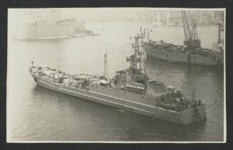 Surface warship with Pennant Number 112 in Grand Harbour, Malta, overlooking Fort St. Angelo